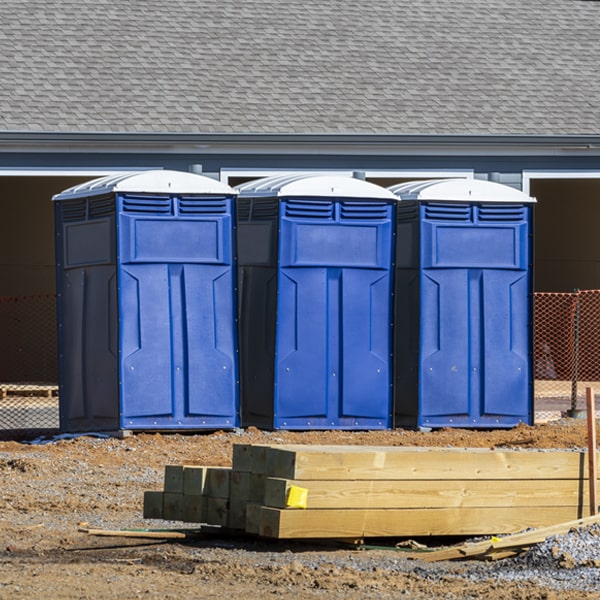 how often are the porta potties cleaned and serviced during a rental period in Staples